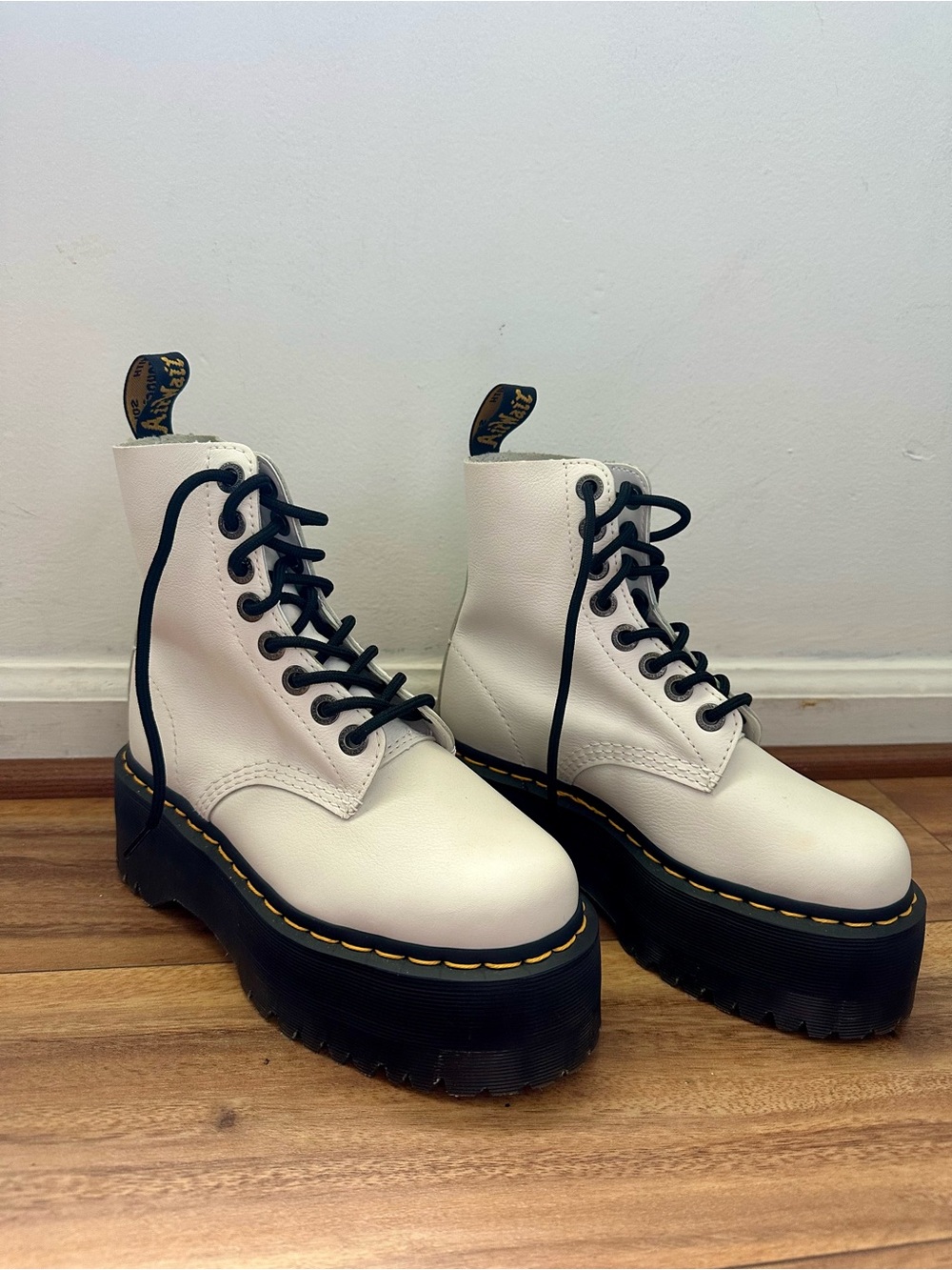 Dr. Martens White Leather Platform Lace-Up Boots with Black Soles